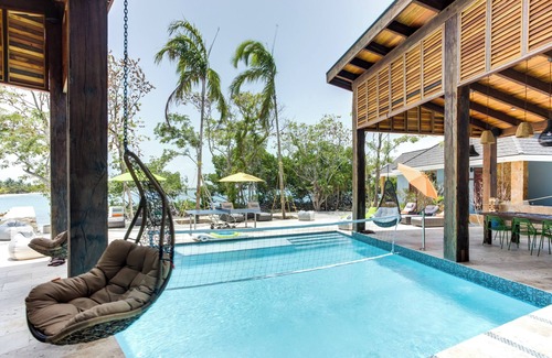 Placencia House | Oceanview Suite with King Bed, Lounge Space & Outdoor Rain Shower