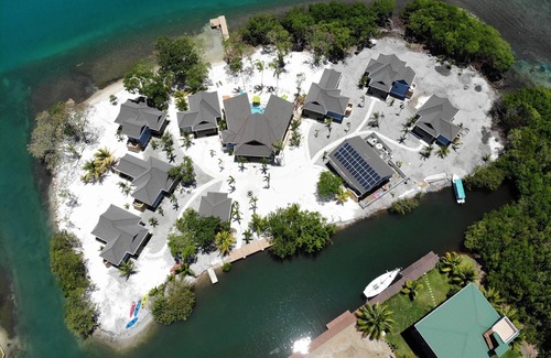 Placencia House | Oceanview Suite with King Bed, Lounge Space & Outdoor Rain Shower