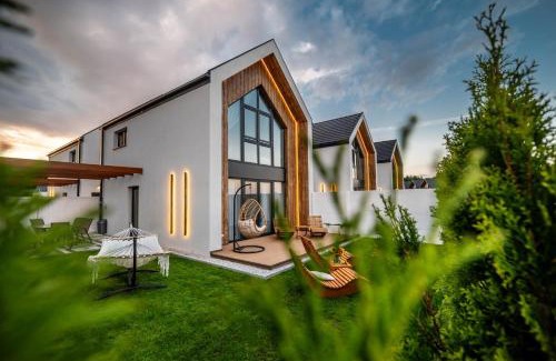 Rewal House | Olivina Park Spa - domki z dostępem do krytego basenu, saun, wyżywienia i atrakcji dla dzieci