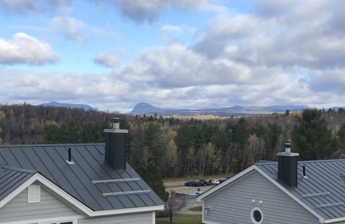 East Burke Condo | On Burke Mountain, bike in bike out. Pool, Hot tub, Gym access at the hotel.