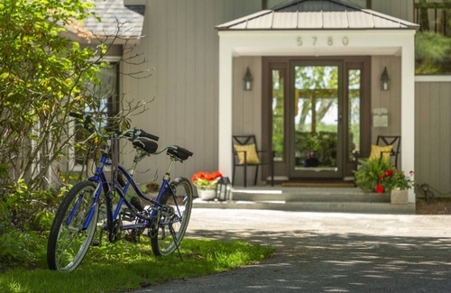 Clam River Cottage | ON TORCH LAKE! Fall Colors are beautiful reflection off of Torch Lake