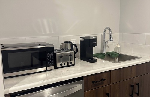 Southwest Edmonton House | One bedroom basement, shared suite with basic amenities for a comfortable stay.