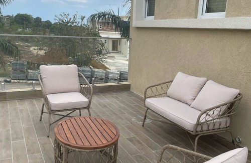 Belmont House | OneLoveVilla is a charming ocean view beach house in New Hope, Westmoreland JA