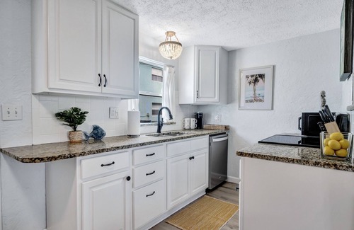 Port Canaveral Condo | Only 1 block from the beach, with private patio and a Pool!