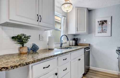 Port Canaveral Condo | Only 1 block from the beach, with private patio and a Pool!