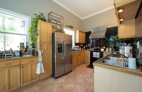 Midtown House | Orchid Oasis - Only Minutes from Smather's and Rest Beaches!