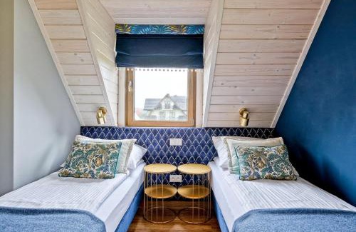 Bialka Tatrzanska Ski Chalet | Osada Białka Tatrzańska - apartamenty & domki z ogrodem dla rodzin Odkryj-Bialke