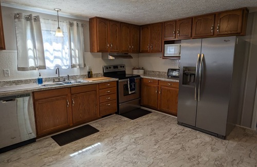 Clinton House | Osprey Bluff, Conveniently located with exceptional sunrises and lake views.