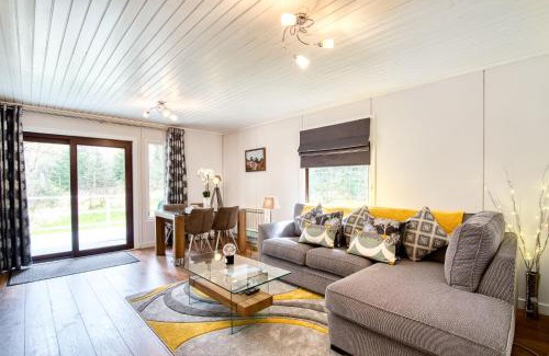 Crianlarich Ski Chalet | Otter with mountain view and enclosed decking
