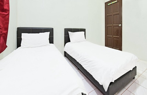 Dungun Hotel | Oyo 90596 Casaria Inn