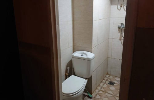 Karawang Hotel | OYO 93386 Apartemen Grand Sentraland by Mira
