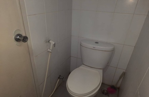 Karawang Hotel | OYO 93386 Apartemen Grand Sentraland by Mira