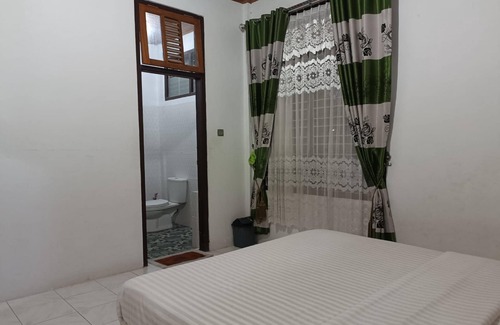 Sumatra Hotel | OYO 93706 Penginapan Syariah Hj. Kenan