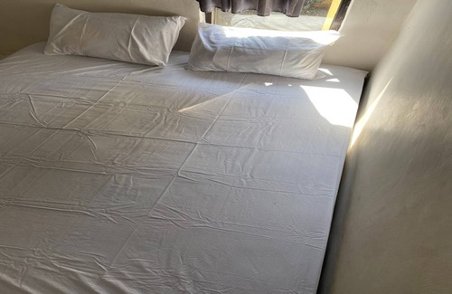Tanjung Hotel | OYO Life Kos Bu Luh Mangku