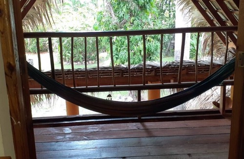 Las Galeras House | Palm-roofed house in the second row to the sea