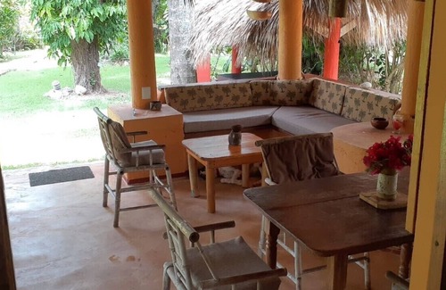 Las Galeras House | Palm-roofed house in the second row to the sea