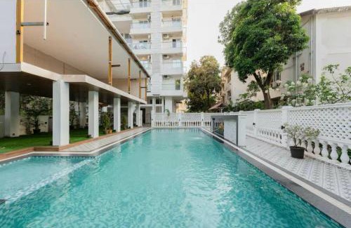 Khattalwada Apartment | Palm View 1BHK with Pool & Café - Sazo Stays
