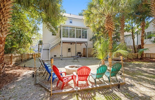 Sunset Point House | Palmetto-lined home with porches, yard & hammock - walk to beach/town