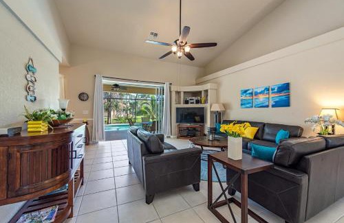 Palm River Estates Villa | Palms and Pool home in Naples best beaches and national parks