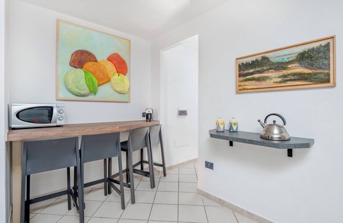 San Teodoro Apartment | Panoramic Holiday Apartment "Isuledda" with Sea View, Shared Pool & Air Conditioning