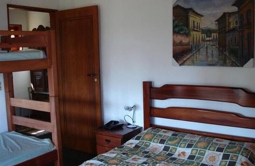 Pereque House | panoramic view of the sea 150 meters from the beach Perequê