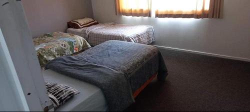 Papamoa Beach House | Papamoa Budget Accommodation
