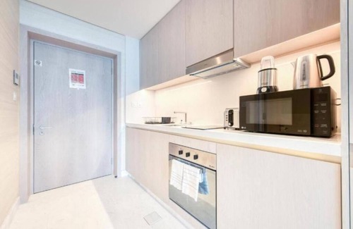 Deira Apartment | Paradise Sea View Studio with St Regis Amenities