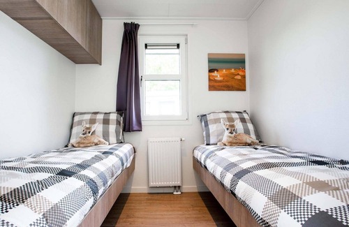 Aalst Ski Chalet | ✓ Parel at Recreatiepark het Esmeer ✓ Holiday home for 4 persons ✓ Located in Aalst (Gelderland) ✓ Waterside holiday park ✓ Book directly through the park