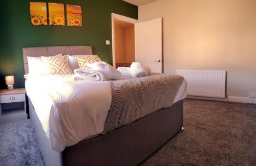 Port Talbot Apartment | Parking, 4 Bedrooms, Small Courtyard