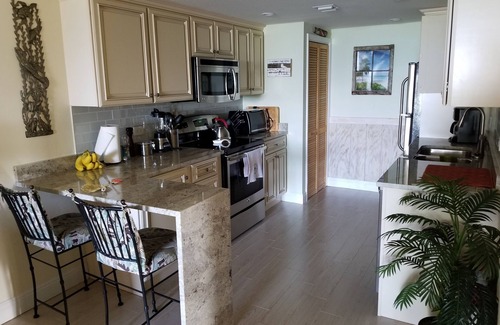 West Bay Condo | "Parrot 6" 37 Steps To The Ocean! Quiet, Ocean View
