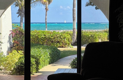 West Bay Condo | "Parrot 6" 37 Steps To The Ocean! Quiet, Ocean View
