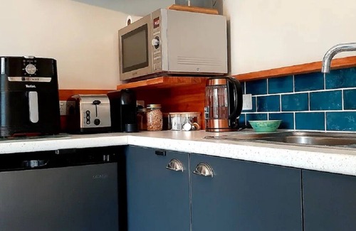 Waihi Beach Cabin | Peace of Bali 1 bed cabin set in a tropical garden with WiFi & AC in Waihi Beach