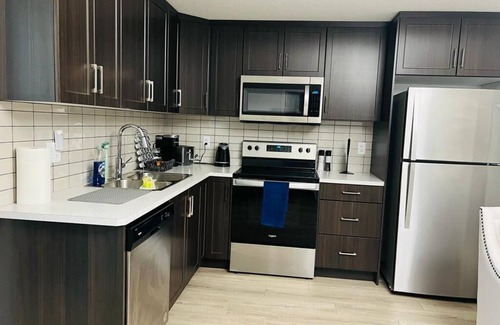 Southeast Calgary Apartment | Peaceful and Spacious Family-friendly Basement Suite Next to Fish Creek Park