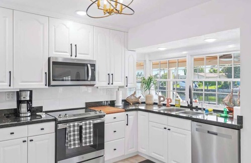 Cypress Lakes Villa | Pelican Point - Waterfront Villa with View, Pool & Boat Rental