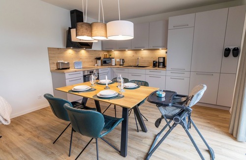 Tossens Apartment | Penthouse Lotta - view of the greenery. Stylish. Family-friendly. Quiet.