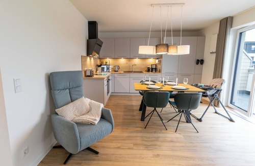 Tossens Apartment | Penthouse Lotta - view of the greenery. Stylish. Family-friendly. Quiet.