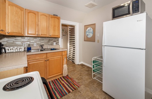 Ypsilanti Apartment | Pet-Friendly Historic Stay I Near Fold Lake, Depot Town & 10 Mins to Ann Arbor