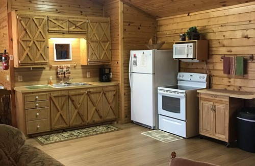 Pettit Cabin | Pettit Mt. Ranch Log Cabin on Gated 36 acres near Pettit Bay and Tenkiller Lake