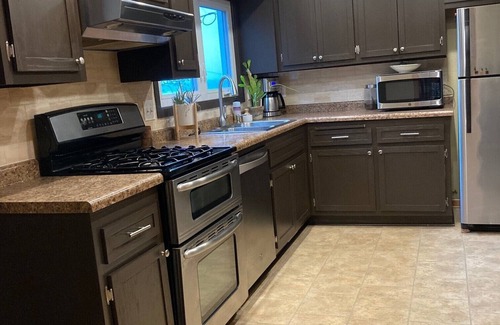 Colgate House | Pewaukee Lake View - Convenient Location - Indoor And Outdoor Spaces!