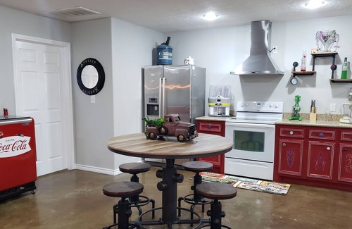 Bryan House | Pinball, pool table, slot machine, shuffleboard, adult drink machines, 65" TV