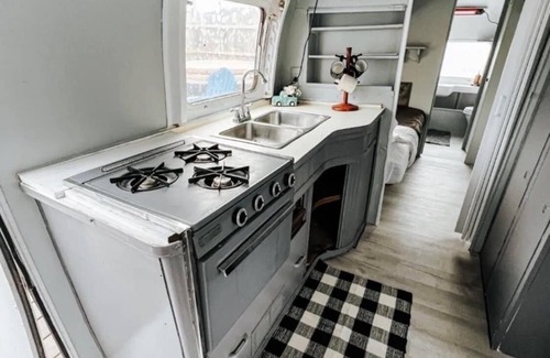 Graford House | Playin Hookie! Vintage Airstream pulled by Panel Wagon/ converted to a bedroom.