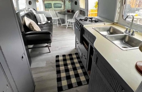 Graford House | Playin Hookie! Vintage Airstream pulled by Panel Wagon/ converted to a bedroom.