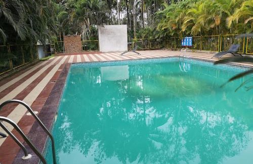 Kushalnagar Hotel | Plumeria Resort