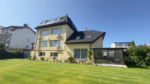 Mielno House | Pod Zielonym Daszkiem