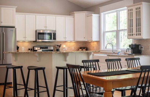 South Haven House | Pool, Hot Tub & Screened Porch w/Fireplace Overlooking Wooded Ravine