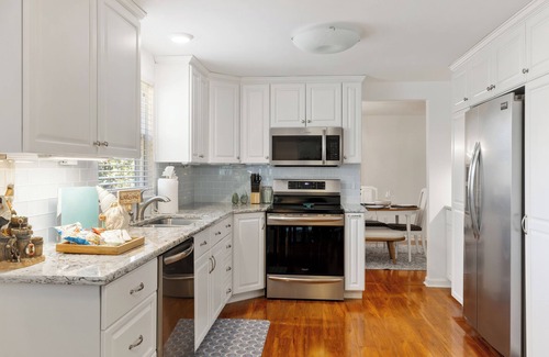 McAlpine House | Poolside Retreat - spacious 4-bedroom retreat with pool, hot tub, game room&more