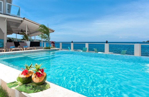 Discovery Bay House | Portside Villa: Private deck and beach access, with amazing views of the ocean