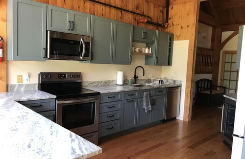 West Baldwin House | Post and Beam House with access to acres of land. Ample parking & new kitchen.