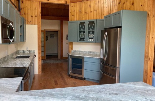 West Baldwin House | Post and Beam House with access to acres of land. Ample parking & new kitchen.