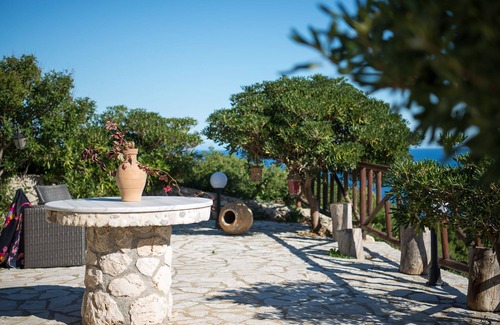 Korithi Apartment | Potamitis Apartments - Stone Windmill